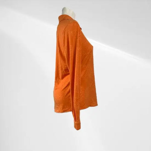 Angelle Milan - Oranje travelstof blouse met bladeren - Travelstof - In 5 maten - Mapsy B.V