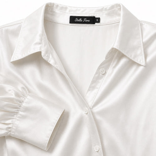 Stella Fiora blouse abstracte print - Detail halslijn en label