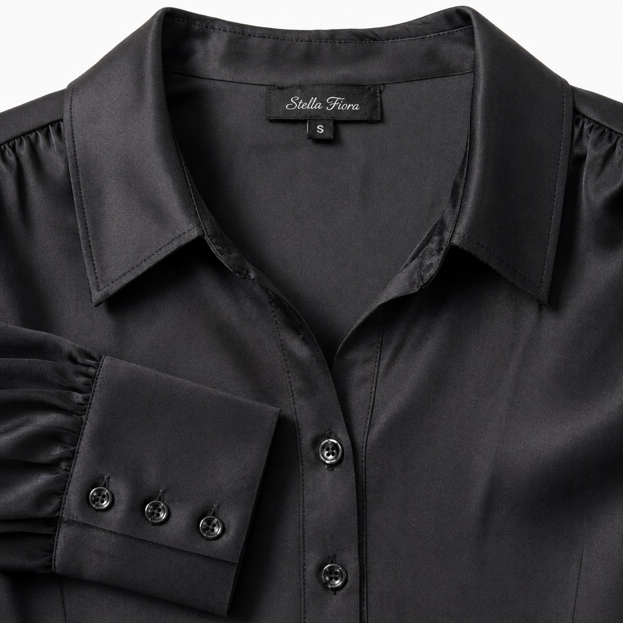 Stella Fiora blouse abstracte print - Detail halslijn en label