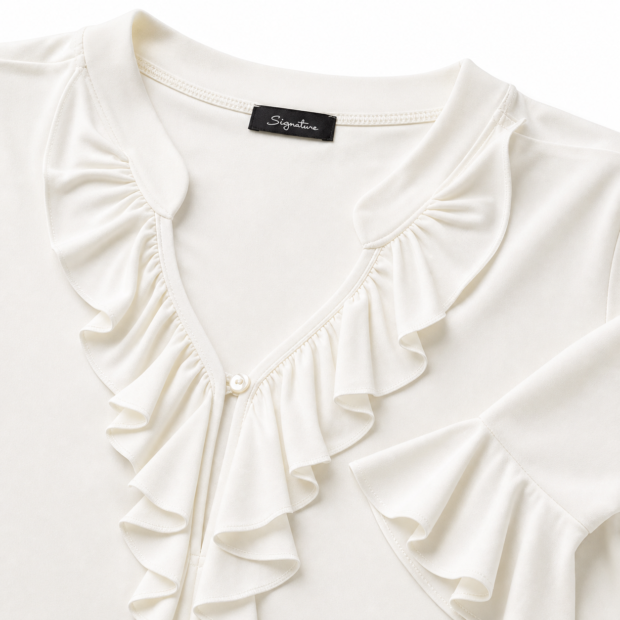 Signature top offwhite ruffle - Detail halslijn en label