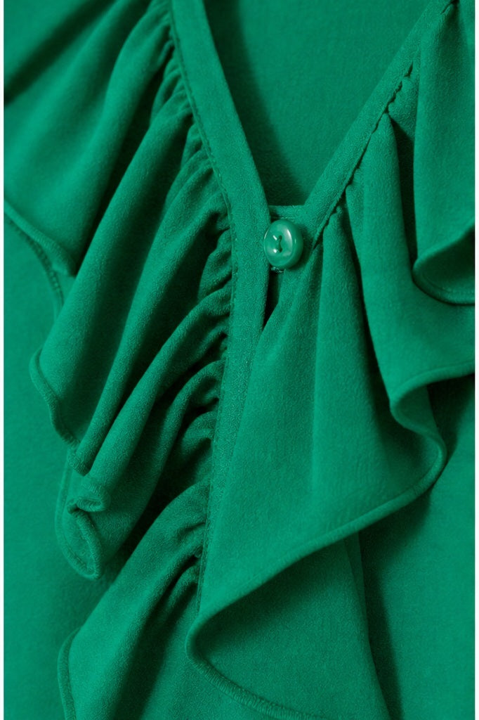 Signature top groen - Detail stof, print en knopen