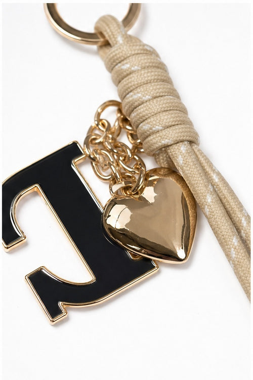 LC sleutelhanger zwart beige - detail van materiaal en afwerking