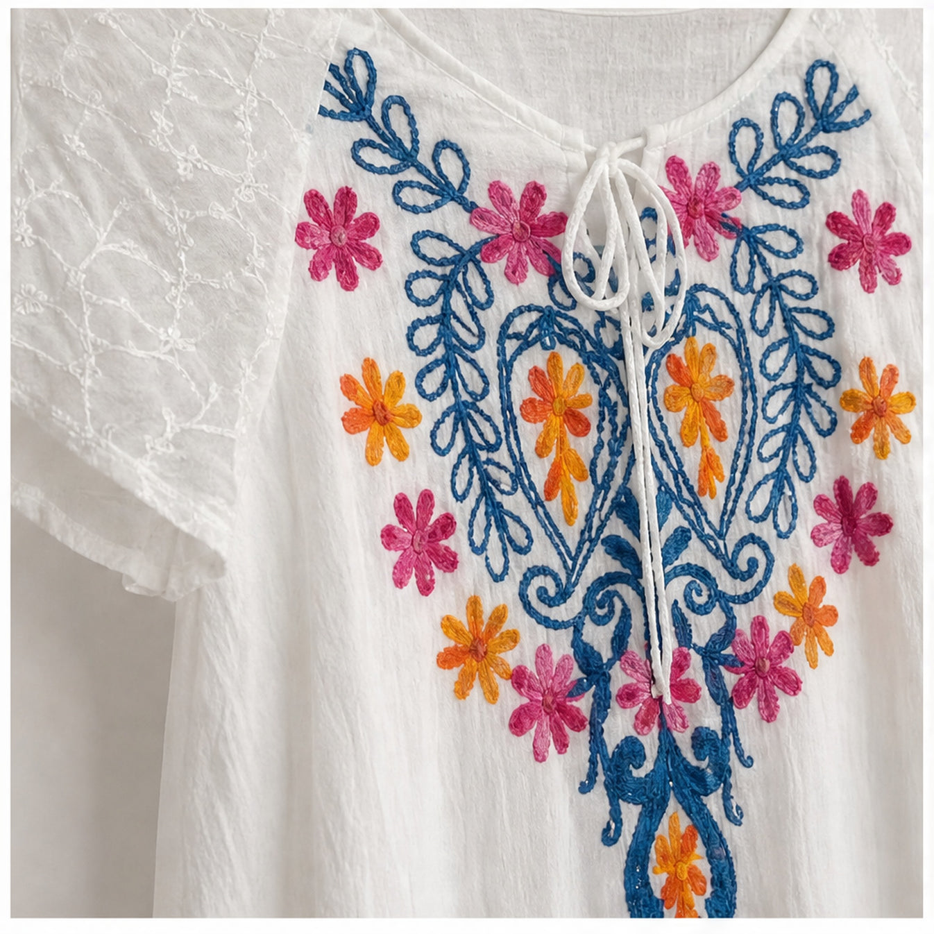HS Jurk Handmade in India Blauw oranje roze borduur - detail van handwerk en borduursel